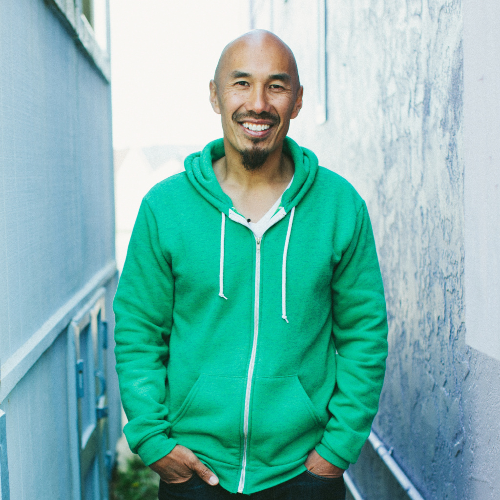 A Man Wearing Green Smiling | The Overwhelming Love of God & its Impact | Francis Chan Devotional on Celebrating God's Love